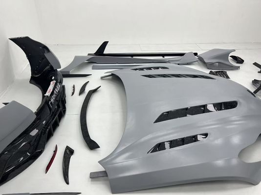 아스턴 마틴 DB11 탄소섬유 바디 키트 DB11 맨소리 스타일 앞뒤 배머 사이드 스커트 펜더 후드 스포일러